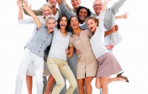 Happy business people laughing against white background